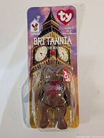 Front view of Britannia the Bear in original blister card
