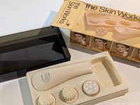 complete set in tray with box and cover visible