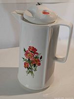 overall view of white floral thermal carafe