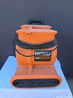 Front and side view of Ridgid air mover with cord wrapped