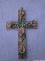 Front view of full terracotta cross showing five calla lilies and hanger loop