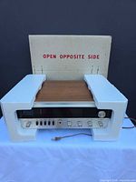 Receiver in styrofoam endcaps with original box visible
