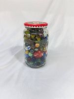 front view of jar filled with marbles