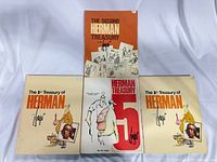 Front covers of four Herman Treasury paperbacks