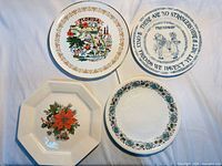 Front view of all four plates showing designs and shapes