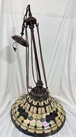 Full chandelier showing shade, chains, rod and canopy
