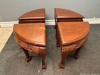 Two of the quarter-circle stools side by side showing tops and legs