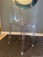 Front angled view of clear acrylic chair