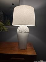 Front view of full lamp showing shade and ceramic body detail