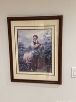 Full view of framed print on wall