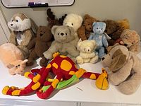 Group shot showing all plush toys on table