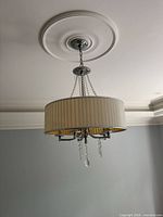 Chandelier hanging from ceiling, overall view
