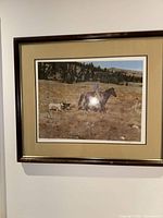 Full view of framed print on wall