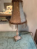 Full view of lamp with shade