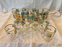 Twelve glasses arranged showing both footed and non-footed styles
