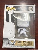 Front view of boxed Funko Pop! Mr. Knight #1048