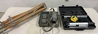 Wooden tripod, green metal case with SM-2 level, black plastic case with laser level kit