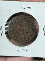 Reverse showing ONE CENT 1909 within maple-leaf wreath