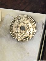 Obverse of coin showing date 1929, crown and monogram