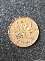 Reverse side showing 1 CENT, 1948 date, maple leaves