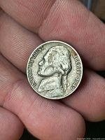 Obverse of 1949 Jefferson nickel showing date and LIBERTY inscription