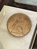 Reverse side showing Britannia design and date