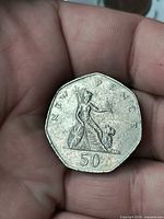 Coin reverse showing Britannia design and denomination