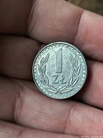 Reverse view showing denomination 1 ZŁ and laurel wreath