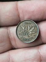 1938 Canadian 1-cent reverse showing maple leaves and date