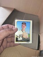 Example 1989 O-Pee-Chee baseball card (John Smiley) held in hand