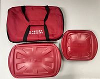 Red insulated Anchor Hocking carrier bag and two red plastic lids