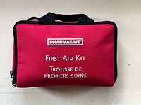 Exterior view of red Pharmasave first aid kit case