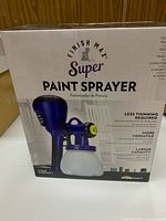 Front of sealed box showing product image and model details