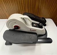 Right side profile showing branding, handle and pedal