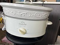 Front view showing full cooker, lid and exterior design