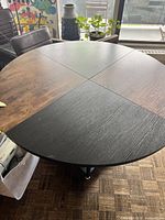 Top view showing two-tone quadrant wood grain tabletop