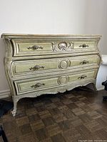 Front view showing dresser shape and drawers