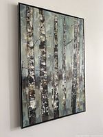 Angled view of framed birch tree canvas print