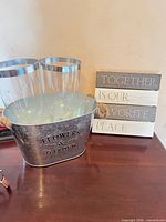 All items: planter, two goblets, wall plaque front
