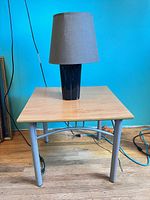 End table front view with lamp on top