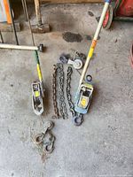 Overview of both Lug-All winches, two chains, two pulley blocks