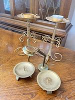 Group shot showing all candle holders and magnifying glass