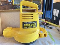 Front of yellow Paramount Super Turbo Sweep 'N Vac