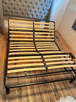 Full view of adjustable queen bed frame, flat position