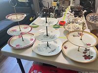 All three multilevel cake stands on table