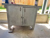 Front view showing overall cabinet, doors and top