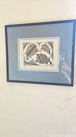 Framed print on wall showing overall appearance