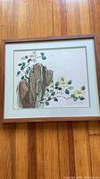 Front view of framed watercolor showing subject and frame