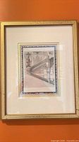 Framed print of grand staircase showing frame style, matting and subject
