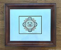 Full view of framed print showing frame, mat, and artwork